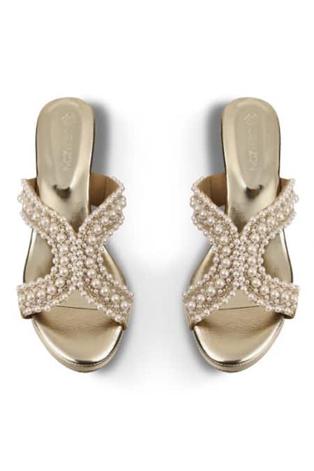 Shop CRIMZON Gold Pearls Norah Embellished Wedges at Aza Fashions Shop_CRIMZON_Gold Pearls Norah Embellished Wedges_at_Aza_Fashions
