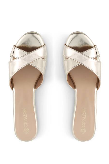 Shop CRIMZON Gold Aiyana Metallic Cross Strap Wedges at Aza Fashions Shop_CRIMZON_Gold Aiyana Metallic Cross Strap Wedges_at_Aza_Fashions