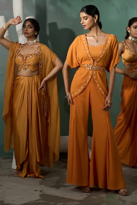 Shop One Knot One By Ashna Yellow Silk Satin, Crepe Marigold Flora Embroidered Cape Draped Skirt Set Online at Aza Fashions Shop_One Knot One By Ashna_Yellow Silk Satin, Crepe Marigold Flora Embroidered Cape Draped Skirt Set _Online_at_Aza_Fashions