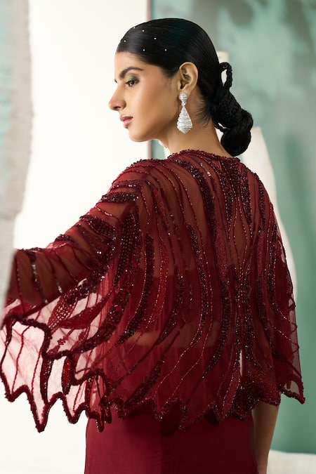 One Knot One By Ashna Maroon Silk Satin, Tulle, Crepe Sequins, Starla Bloom Shrug Draped Skirt Set at Aza Fashions One Knot One By Ashna_Maroon Silk Satin, Tulle, Crepe Sequins, Starla Bloom Shrug Draped Skirt Set _at_Aza_Fashions
