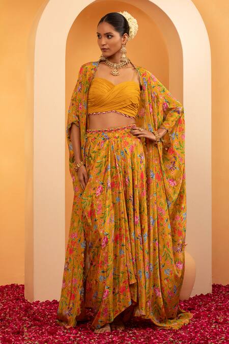 Swati Wadhwani Couture Yellow Crepe Sequins Sweetheart Neck Saanjh Printed Skirt Set With Cape at Aza Fashions Swati Wadhwani Couture_Yellow Crepe Sequins Sweetheart Neck Saanjh Printed Skirt Set With Cape _at_Aza_Fashions