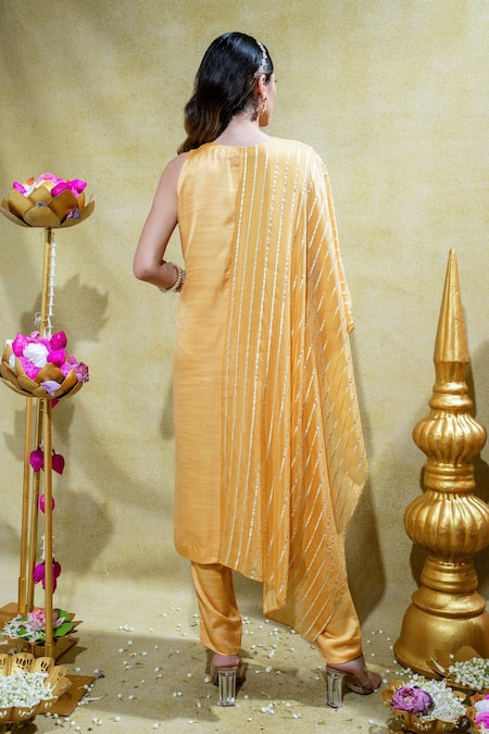 Shop Sheela Suthar Yellow Silk, Organza Zari, Embroidery Lotus Zardosi Asymmetric Kurta And Pant Set at Aza Fashions Shop_Sheela Suthar_Yellow Silk, Organza Zari, Embroidery Lotus Zardosi Asymmetric Kurta And Pant Set _at_Aza_Fashions