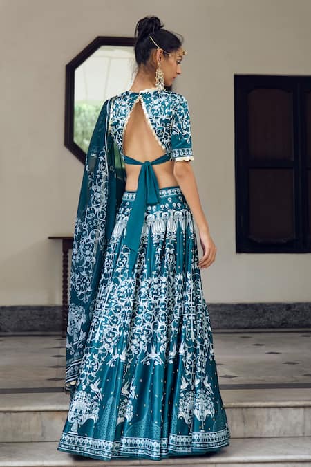 Shop Limerick By Abirr N' Nanki Blue Georgette, Silk Embroidery, Beads, Applique V-neck Floral Print Lehenga Set at Aza Fashions Shop_Limerick By Abirr N' Nanki_Blue Georgette, Silk Embroidery, Beads, Applique V-neck Floral Print Lehenga Set _at_Aza_Fashions