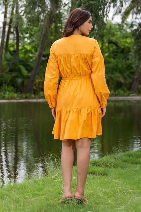 Shop_Saangi_Yellow Cotton Round Neck Pure Solid Gathered Dress_at_Aza_Fashions