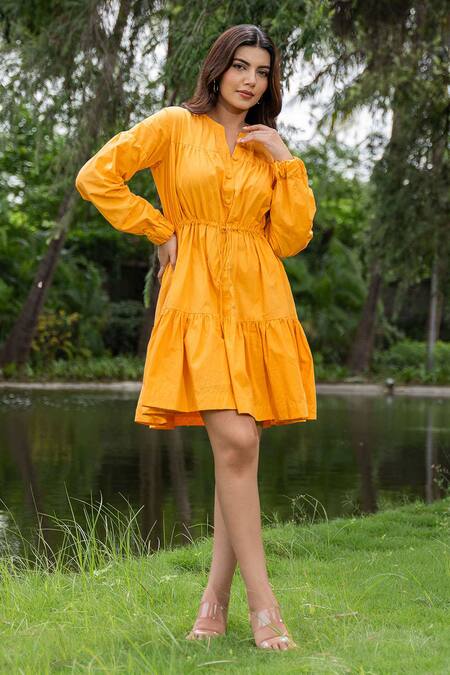 Saangi_Yellow Cotton Round Neck Pure Solid Gathered Dress_Online_at_Aza_Fashions