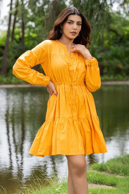 Saangi_Yellow Cotton Round Neck Pure Solid Gathered Dress_at_Aza_Fashions