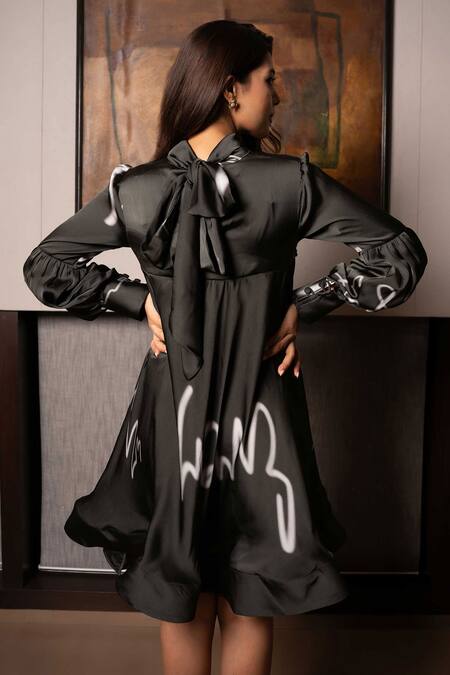 Shop Saangi Black Satin Bandeau Neck Doodle Print Back Tie Up Dress at Aza Fashions Shop_Saangi_Black Satin Bandeau Neck Doodle Print Back Tie Up Dress_at_Aza_Fashions