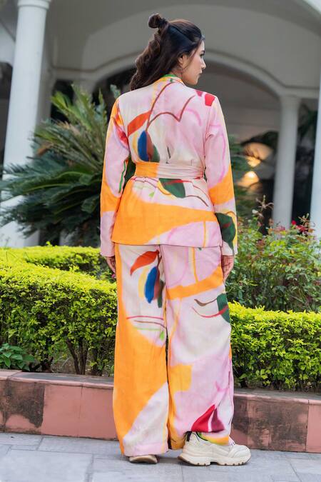 Shop Saangi Multi Color Cotton Abstract Hand Painted Overlap Blazer With Flared Pant at Aza Fashions Shop_Saangi_Multi Color Cotton Abstract Hand Painted Overlap Blazer With Flared Pant_at_Aza_Fashions