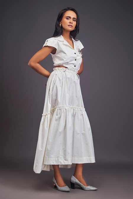 Deepika Arora White Cotton Embroidery Collared Waist Cutout Tiered Maxi Dress at Aza Fashions Deepika Arora_White Cotton Embroidery Collared Waist Cutout Tiered Maxi Dress _at_Aza_Fashions