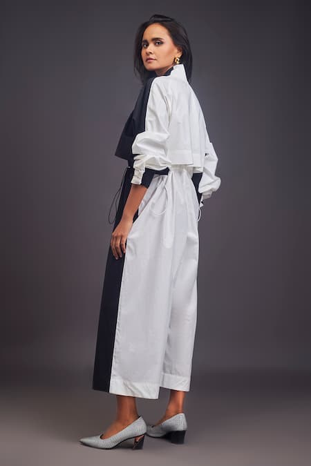 Shop Deepika Arora Black Cotton Embroidery Mandarin Collar Badge Detailed Front Jumpsuit at Aza Fashions Shop_Deepika Arora_Black Cotton Embroidery Mandarin Collar Badge Detailed Front Jumpsuit _at_Aza_Fashions