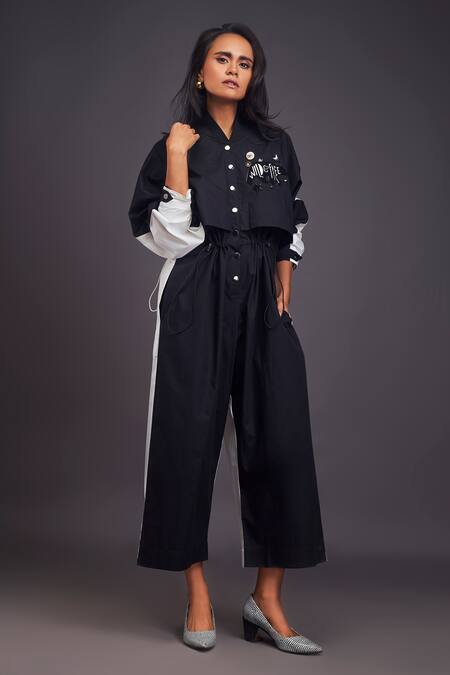 Deepika Arora Black Cotton Embroidery Mandarin Collar Badge Detailed Front Jumpsuit at Aza Fashions Deepika Arora_Black Cotton Embroidery Mandarin Collar Badge Detailed Front Jumpsuit _at_Aza_Fashions