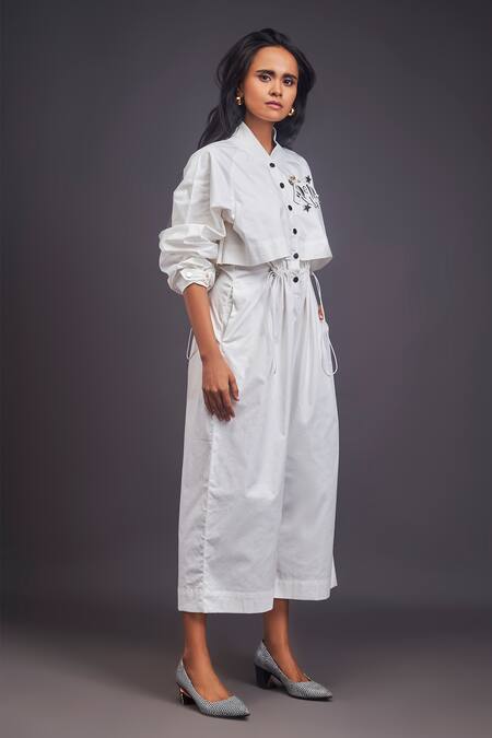 Deepika Arora_White Cotton Embroidery Mandarin Collar Badge Detailed Jumpsuit _at_Aza_Fashions