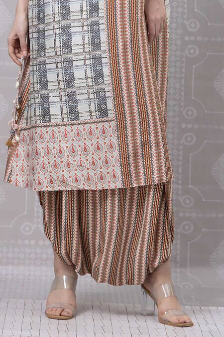 Buy Niki Mahajan Beige Crepe Printed Vintage Floral Round Beaded Kurta With Draped Pant Online at Aza Fashions Buy_Niki Mahajan_Beige Crepe Printed Vintage Floral Round Beaded Kurta With Draped Pant _Online_at_Aza_Fashions