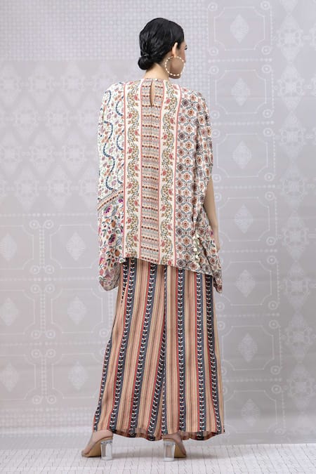 Shop Niki Mahajan Beige Crepe Printed Vintage Floral Round Beads Embroidered Short Kurta With Pant at Aza Fashions Shop_Niki Mahajan_Beige Crepe Printed Vintage Floral Round Beads Embroidered Short Kurta With Pant _at_Aza_Fashions