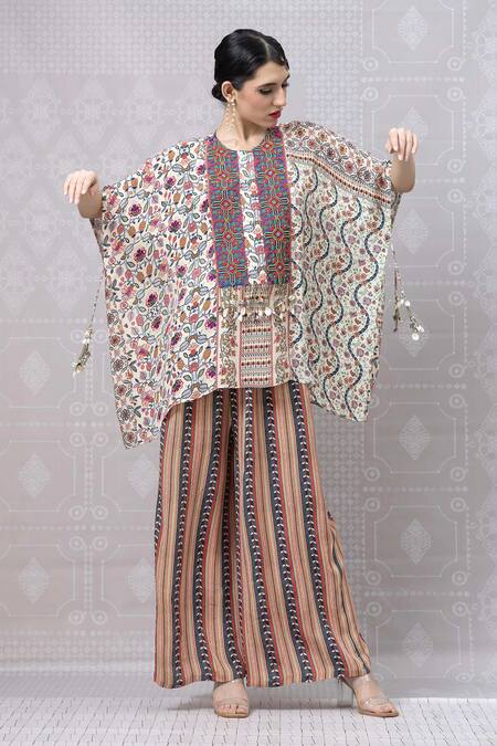 Shop Niki Mahajan Beige Crepe Printed Vintage Floral Round Beads Embroidered Short Kurta With Pant Online at Aza Fashions Shop_Niki Mahajan_Beige Crepe Printed Vintage Floral Round Beads Embroidered Short Kurta With Pant _Online_at_Aza_Fashions