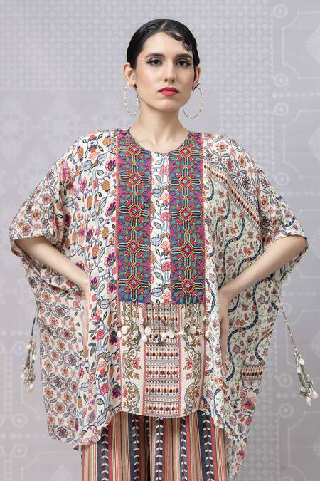 Niki Mahajan Beige Crepe Printed Vintage Floral Round Beads Embroidered Short Kurta With Pant at Aza Fashions Niki Mahajan_Beige Crepe Printed Vintage Floral Round Beads Embroidered Short Kurta With Pant _at_Aza_Fashions