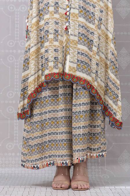 Niki Mahajan Beige Crepe Printed Vintage Floral Round Abstract Kurta With Pant at Aza Fashions Niki Mahajan_Beige Crepe Printed Vintage Floral Round Abstract Kurta With Pant _at_Aza_Fashions