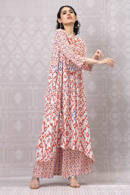 Shop_Niki Mahajan_Pink Crepe Pearls, Sequins Round Hand Embroidered Asymmetric Kurta And Pant Set _Online_at_Aza_Fashions