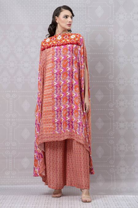 Niki Mahajan_Red Crepe Pearls, Sequins Round Neck Asymmetric Hand Embroidered Kurta With Pant _Online_at_Aza_Fashions