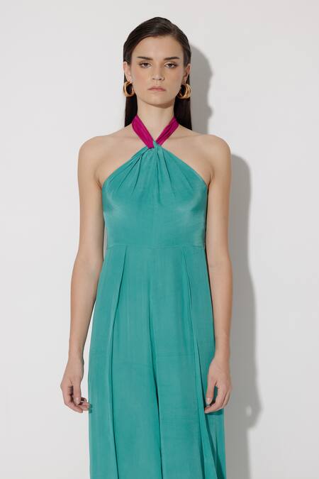 Twinkle Hanspal_Green Crepe Halter Julia Shirred Back Jumpsuit_at_Aza_Fashions