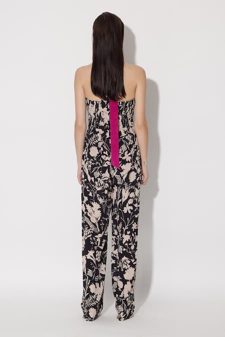 Shop Twinkle Hanspal Black Crepe Printed Floral Halter Jane Jumpsuit at Aza Fashions Shop_Twinkle Hanspal_Black Crepe Printed Floral Halter Jane Jumpsuit_at_Aza_Fashions