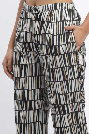 ABRAHAM AND THAKORE_Black Chanderi Sequins Broken Lines Print Trouser _at_Aza_Fashions