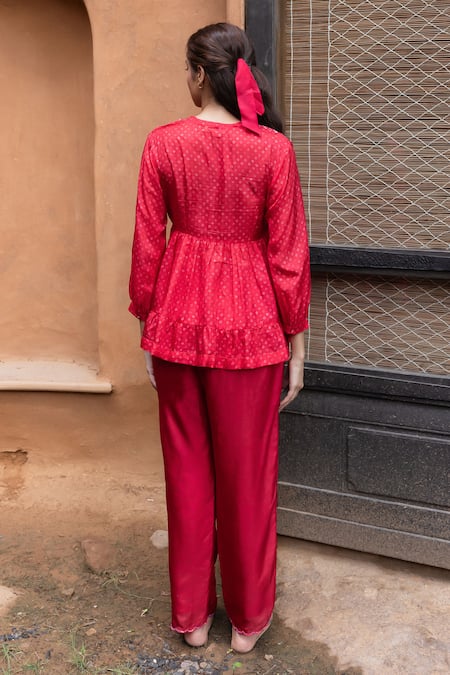 Shop Ayaka Red Viscose Sequins, Beads, Embroidery Cara Tiered Bandhani Print Peplum Top at Aza Fashions Shop_Ayaka_Red Viscose Sequins, Beads, Embroidery Cara Tiered Bandhani Print Peplum Top _at_Aza_Fashions