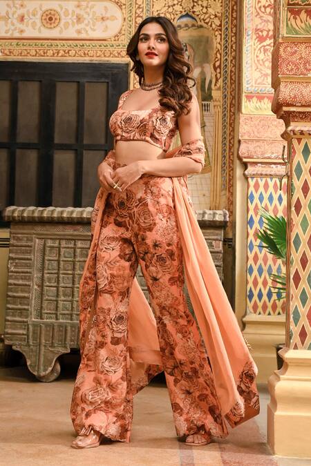 Buy Sanam Beige Silk, Crepe Tassels, Floral Print Sleeveless Blouse And Flared Trouser Set Online at Aza Fashions Buy_Sanam_Beige Silk, Crepe Tassels, Floral Print Sleeveless Blouse And Flared Trouser Set _Online_at_Aza_Fashions