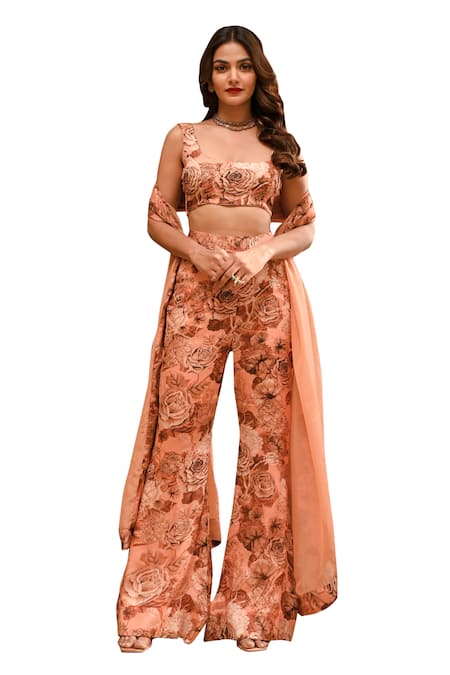 Shop Sanam Beige Silk, Crepe Tassels, Floral Print Sleeveless Blouse And Flared Trouser Set Online at Aza Fashions Shop_Sanam_Beige Silk, Crepe Tassels, Floral Print Sleeveless Blouse And Flared Trouser Set _Online_at_Aza_Fashions