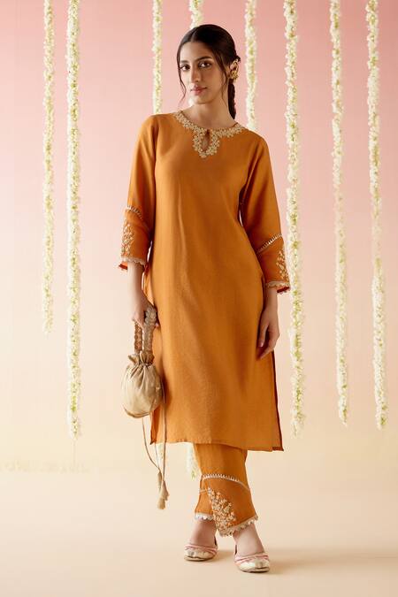 Nero India_Orange Chanderi, Viscose Embroidery, Tassels Dori Straight Kurta Pant Set_at_Aza_Fashions