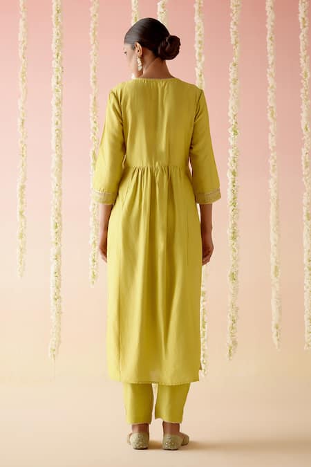 Shop Nero India Yellow Chanderi Gota Patti, Embroidery V-neck Lace Kurta With Pant at Aza Fashions Shop_Nero India_Yellow Chanderi Gota Patti, Embroidery V-neck Lace Kurta With Pant _at_Aza_Fashions