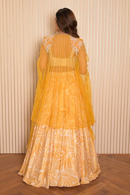 Shop Vridhi Somaani Yellow Silk, Organza, Net Pearls, Yaffira Tropical Print Lehenga And Cape Set at Aza Fashions Shop_Vridhi Somaani_Yellow Silk, Organza, Net Pearls, Yaffira Tropical Print Lehenga And Cape Set _at_Aza_Fashions