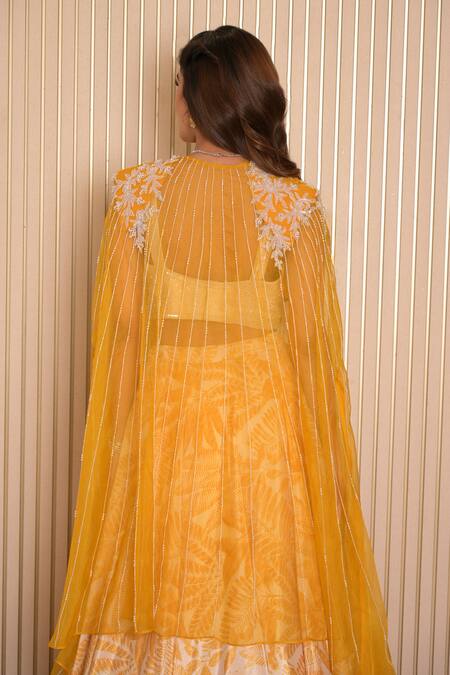 Vridhi Somaani Yellow Silk, Organza, Net Pearls, Yaffira Tropical Print Lehenga And Cape Set at Aza Fashions Vridhi Somaani_Yellow Silk, Organza, Net Pearls, Yaffira Tropical Print Lehenga And Cape Set _at_Aza_Fashions