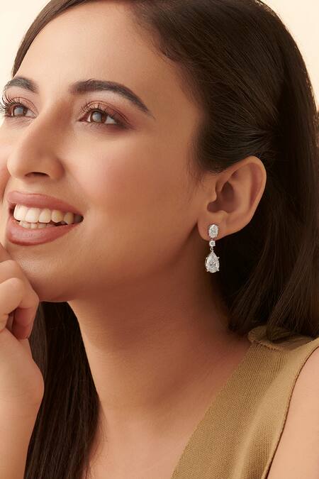 Shop Fiona Diamonds White Imitation Diamonds 14kt Gold Pear Drop Lab Earrings at Aza Fashions Shop_Fiona Diamonds_White Imitation Diamonds 14kt Gold Pear Drop Lab Earrings_at_Aza_Fashions
