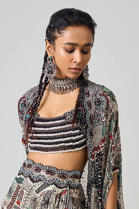 Nupur Kanoi Off White Crepe, Georgette, Satin Beads, Tribal Embellished Cape Cowl Skirt Set Online at Aza Fashions Nupur Kanoi_Off White Crepe, Georgette, Satin Beads, Tribal Embellished Cape Cowl Skirt Set _Online_at_Aza_Fashions