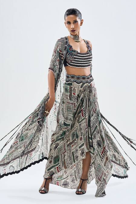 Nupur Kanoi Off White Crepe, Georgette, Satin Beads, Tribal Embellished Cape Cowl Skirt Set at Aza Fashions Nupur Kanoi_Off White Crepe, Georgette, Satin Beads, Tribal Embellished Cape Cowl Skirt Set _at_Aza_Fashions