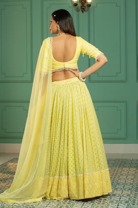 Shop_Monk & Mei By Sonia Anand_Yellow Organza, Georgette Pearls, Sequins V-neck Geometric Woven Lehenga Set _at_Aza_Fashions