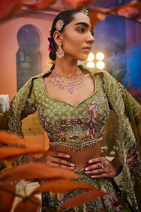 Show Shaa Green Silk, Net Tassels, Embroidery Sweetheart Neck Floral Bridal Lehenga Set Online at Aza Fashions Show Shaa_Green Silk, Net Tassels, Embroidery Sweetheart Neck Floral Bridal Lehenga Set _Online_at_Aza_Fashions