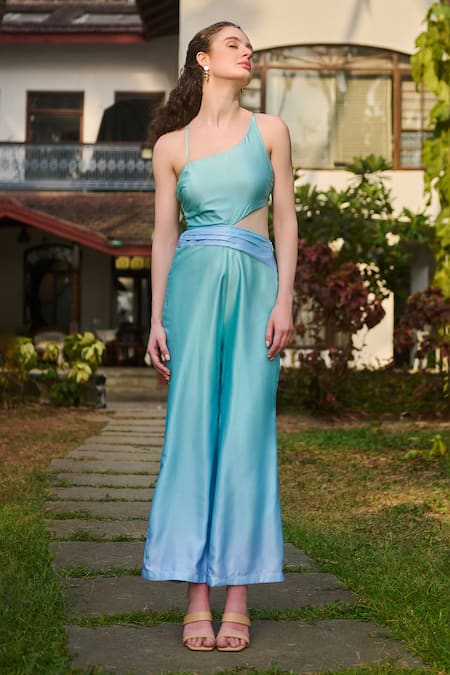 Shop Verano By Tanya Blue Satin, Crepe Beads Asymmetric Azzura Cutout Jumpsuit at Aza Fashions Shop_Verano By Tanya_Blue Satin, Crepe Beads Asymmetric Azzura Cutout Jumpsuit _at_Aza_Fashions