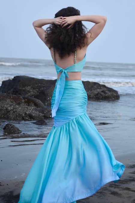 Shop Verano By Tanya Blue Satin, Crepe Ruffles Azzura High Low Ruched Skirt at Aza Fashions Shop_Verano By Tanya_Blue Satin, Crepe Ruffles Azzura High Low Ruched Skirt _at_Aza_Fashions