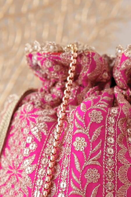 Buy_Amyra_Red Embroidery, Tassels Mirai Flower Potli_Online_at_Aza_Fashions