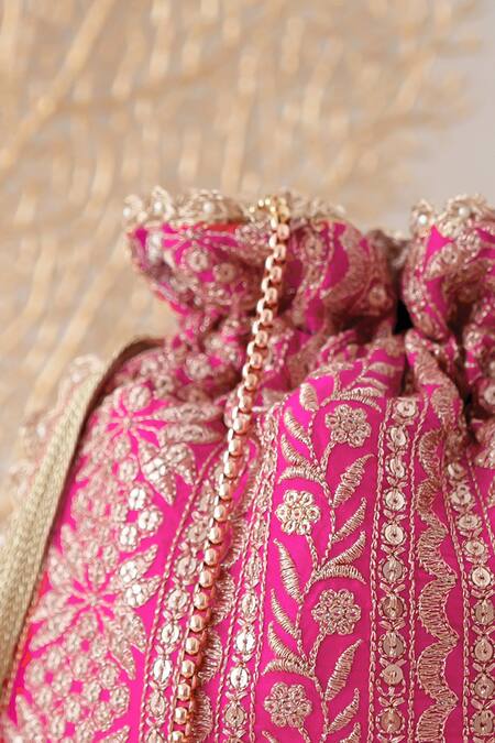 Amyra_Red Embroidery, Tassels Mirai Flower Potli_at_Aza_Fashions