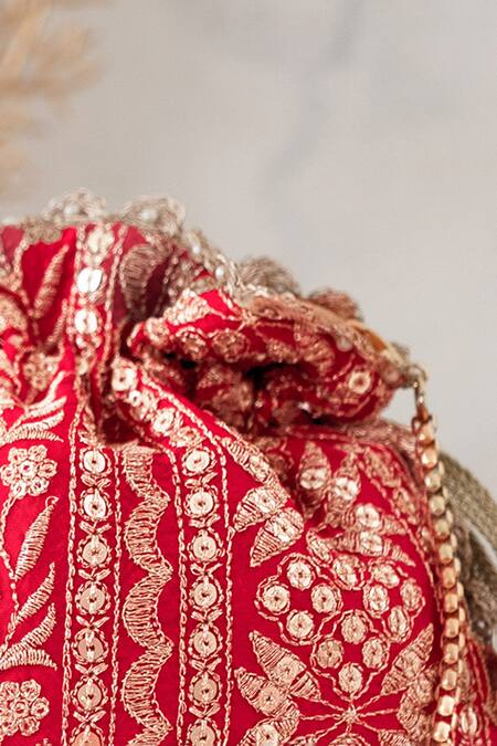 Shop_Amyra_Pink Embroidery, Tassels Mirai Floral Potli_Online_at_Aza_Fashions