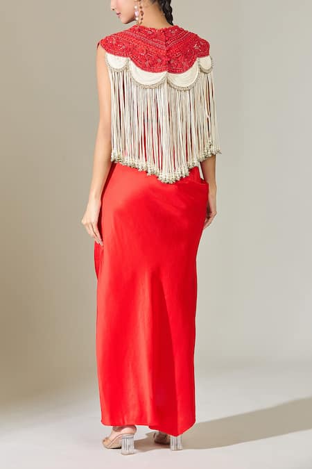 Shop Anamika Khanna Red Cotton Tassels Round Neck Embroidered Cape And Draped Skirt Set at Aza Fashions Shop_Anamika Khanna_Red Cotton Tassels Round Neck Embroidered Cape And Draped Skirt Set_at_Aza_Fashions
