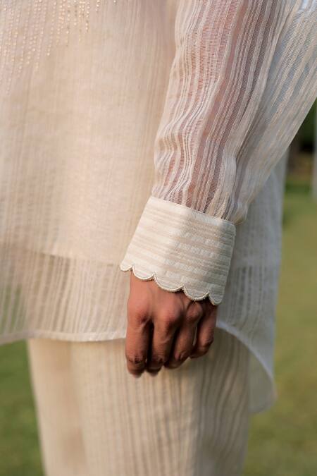 Meher By Islie Beige Chanderi Beads Sheer Delight Woven High-low Shirt With Pant at Aza Fashions Meher By Islie_Beige Chanderi Beads Sheer Delight Woven High-low Shirt With Pant _at_Aza_Fashions