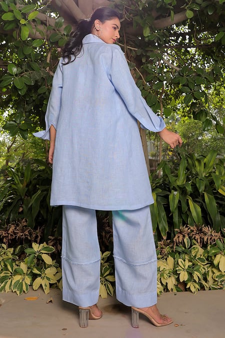 Shop Meher By Islie Blue Cotton Embroidery Open Neck Rose Applique Embellished Long Jacket Pant Set at Aza Fashions Shop_Meher By Islie_Blue Cotton Embroidery Open Neck Rose Applique Embellished Long Jacket Pant Set _at_Aza_Fashions