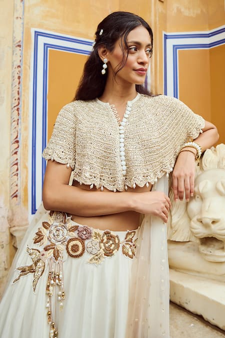 Nikita Vishakha Ivory Net, Viscose, Organza Pearls, Floral Embroidered Flare Lehenga Set at Aza Fashions Nikita Vishakha_Ivory Net, Viscose, Organza Pearls, Floral Embroidered Flare Lehenga Set _at_Aza_Fashions