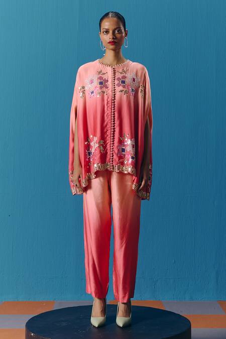Pooja Rajgarhia Gupta Peach Silk Satin Sequins, Pearls Round Neck Dusk Embroidered Cape Top With Pant Online at Aza Fashions Pooja Rajgarhia Gupta_Peach Silk Satin Sequins, Pearls Round Neck Dusk Embroidered Cape Top With Pant _Online_at_Aza_Fashions