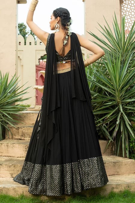 Shop_Monk & Mei By Sonia Anand_Black Georgette Mirrors, Tassels V-neck Nadia Embellished Lehenga Set _at_Aza_Fashions