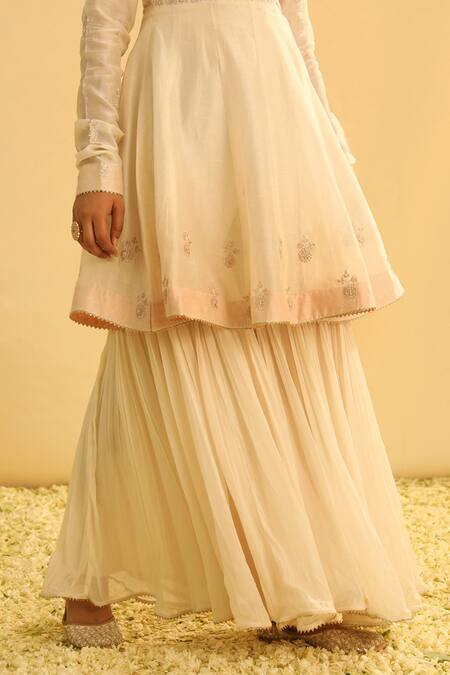 Sheetal Batra_Ivory Organza, Georgette, Shahana Floral Yoke Peplum Kurta Set _at_Aza_Fashions